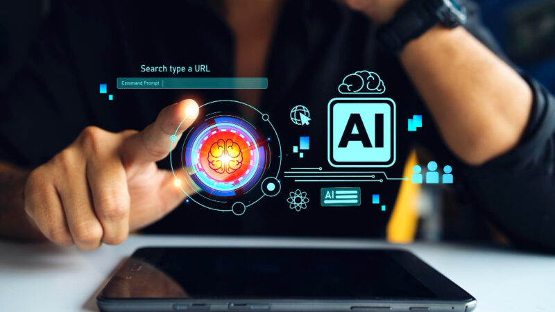 Developer working alongside AI coding tools on a laptop, representing AI-assisted web development